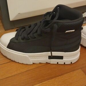 Puma high tops, wore them once.  Brand new